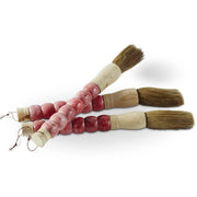 Chinese calligraphy brush, red